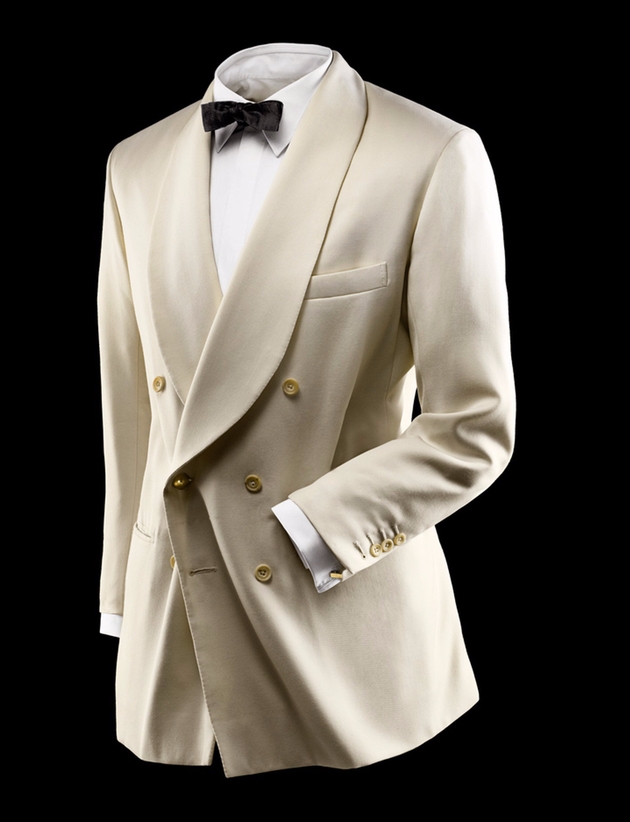 Cream dinner jacket with shawl lapel and black bow tie by London menswear specialist Steed Bespoke Tailors