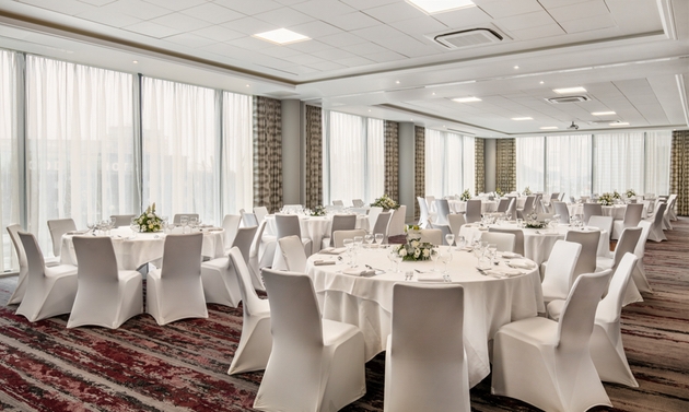 Wedding suite set up at Crowne Plaza London Docklands with white colour scheme