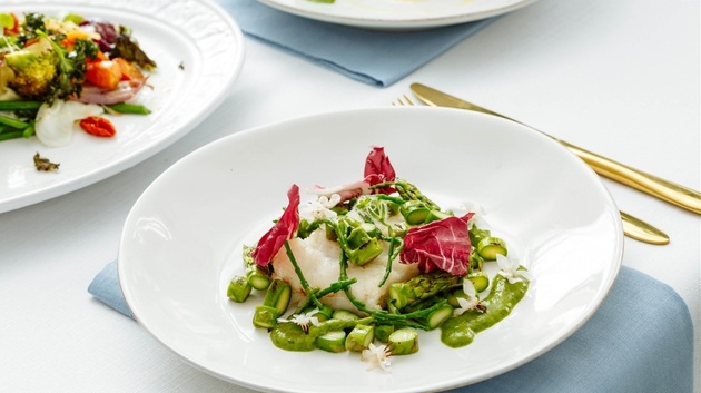 Plate and gold cutlery ready for wedding breakfast from London caterer Social Pantry