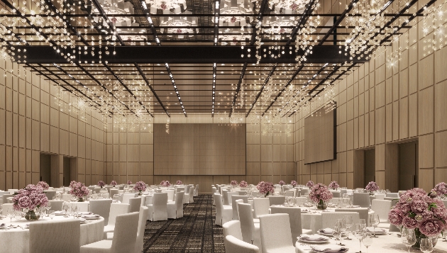 rectangle ballroom with glass ceiling and wedding reception tables