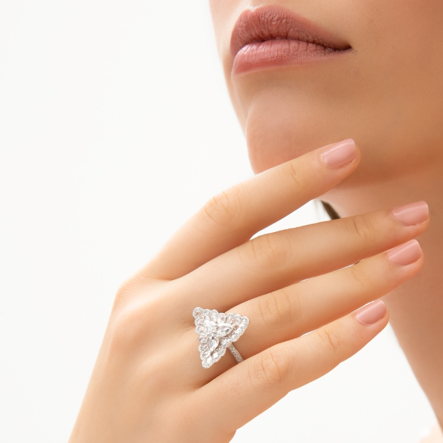 triangle diamond ring on a hand