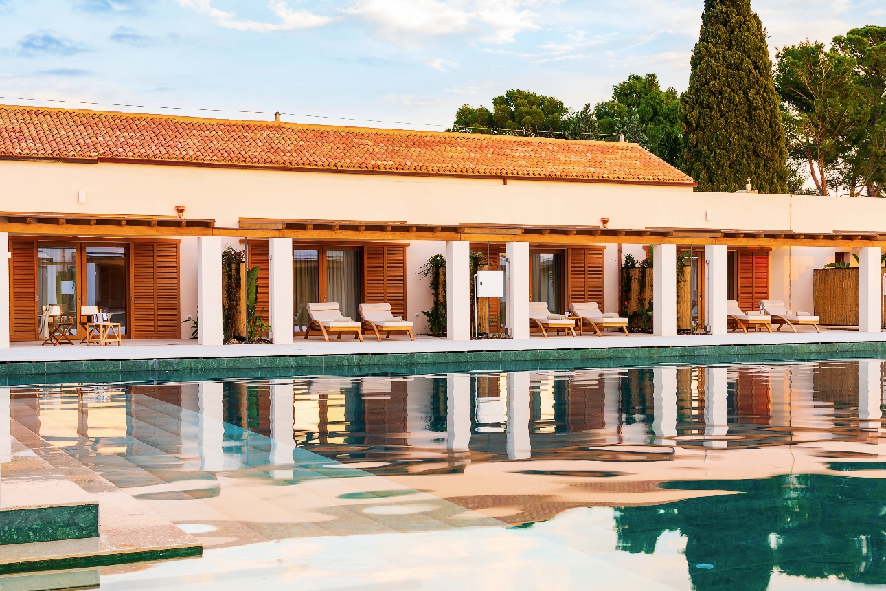 pool side villas with sunbeds