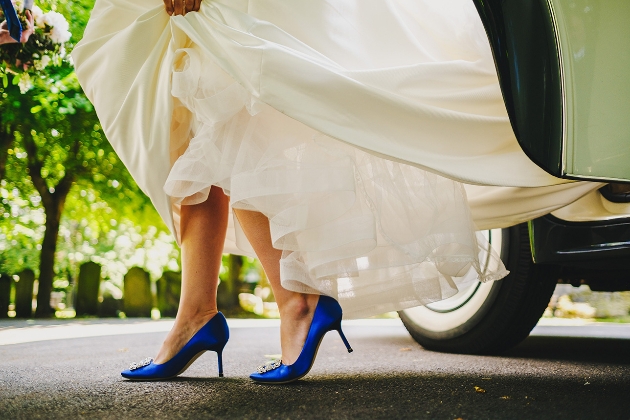 Bride stepping out of car