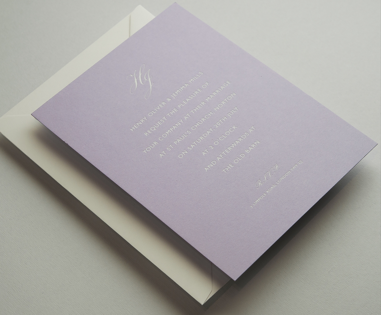 lavender invite with silver embossed text