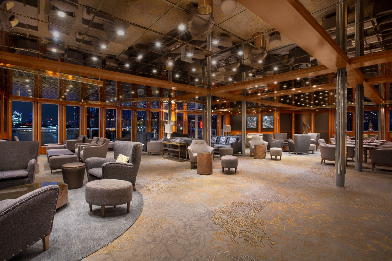 yacht interior wood pillars mirrored ceiling, seating areas