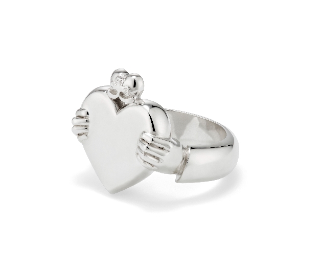 silver rings hands holding solid heart