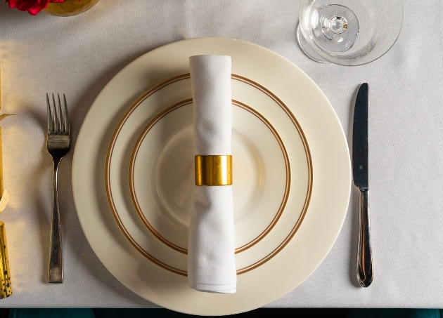white plates and cutlery