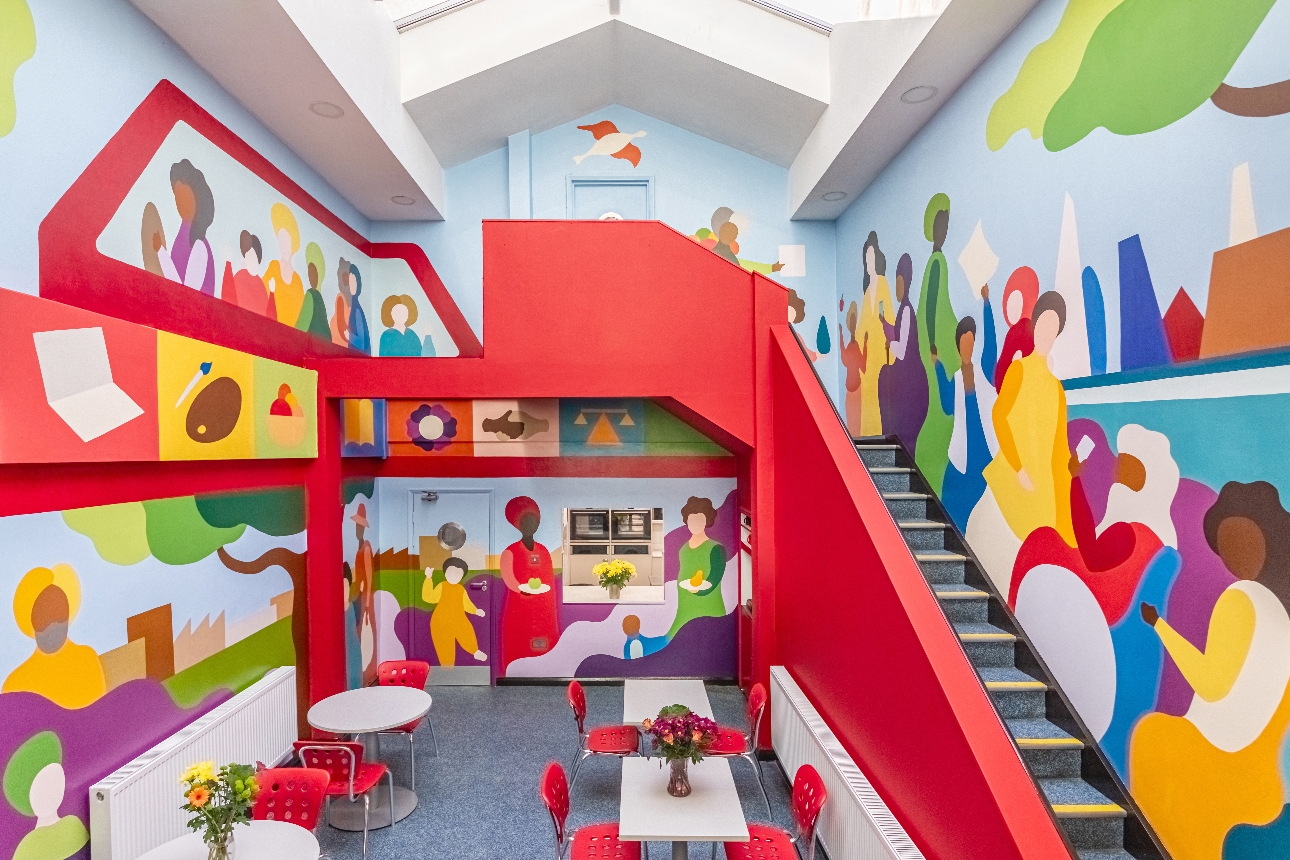 centre main reception with colourful wall murals