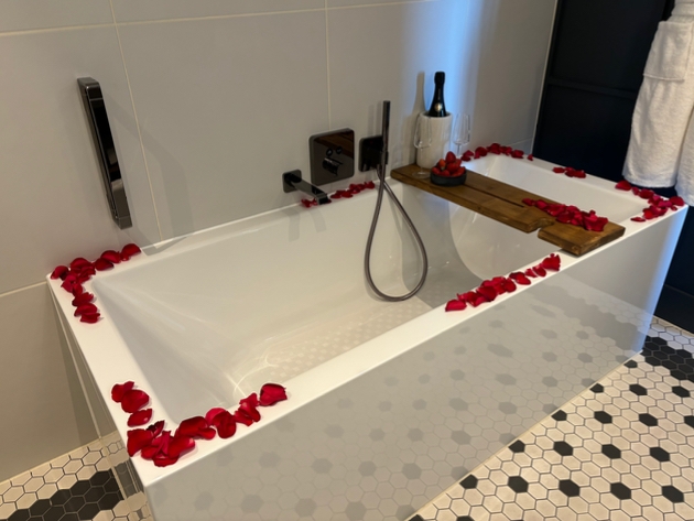 Bath decorated with petals for weddings at Stratford's The Gantry hotel