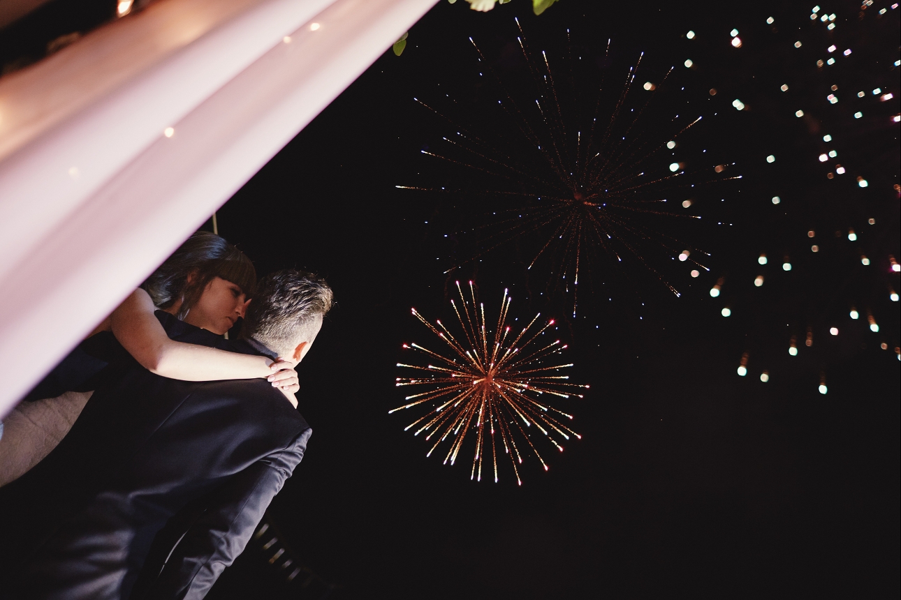wedding couple watching fireworks