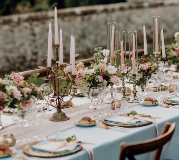 wedding table set up with blue and pink decor