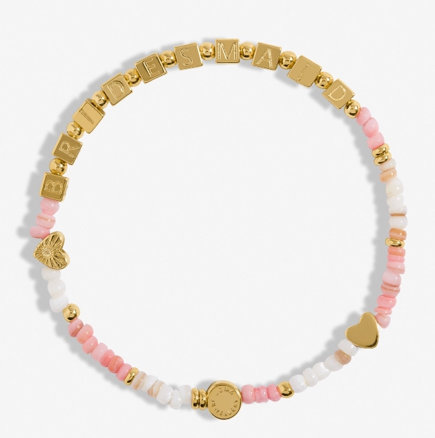 Joma Jewellery “a littles” bridal bracelets with pearls, gemstones, and gold-stamped packaging.