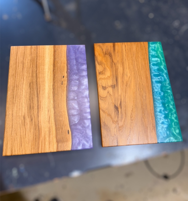 examples of the resin and wood serving boards you can make at a Blueprint Woodcraft workshop